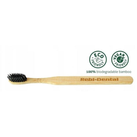 Weiche Rebi-Dental Zahnbürste mit Aktivkohle von Dystrybutor Biogo.pl, ideal für sanfte Zahnreinigung.