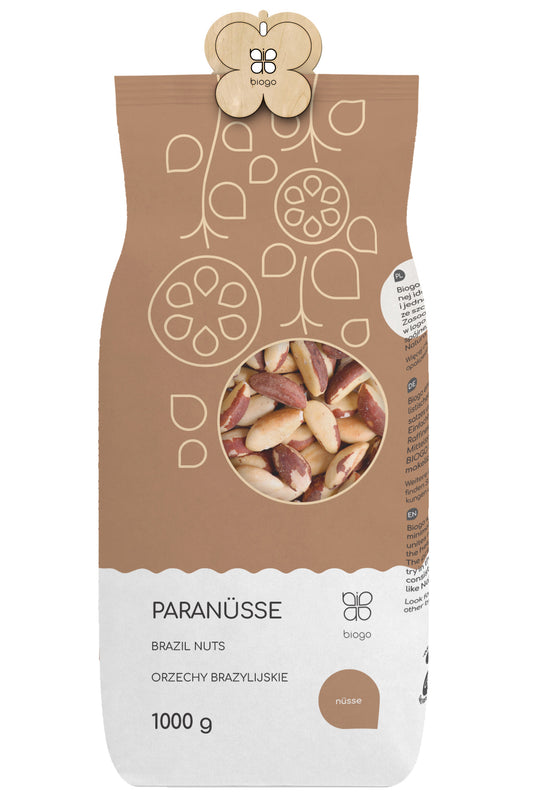 Bio-Paranüsse 1 kg von Biogo GmbH, rohe und geröstete brasilianische Paranüsse in einer transparenten Verpackung.