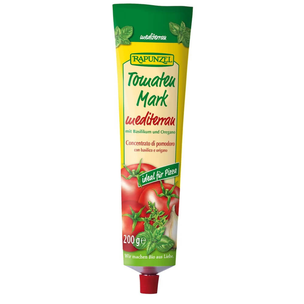 Bio Tomatenmark mit Basilikum und Oregano in Tube, 200 g, von RAPUNZEL, zeigt die Tube mit fruchtigem Tomatenmark und frischen Kräutern.