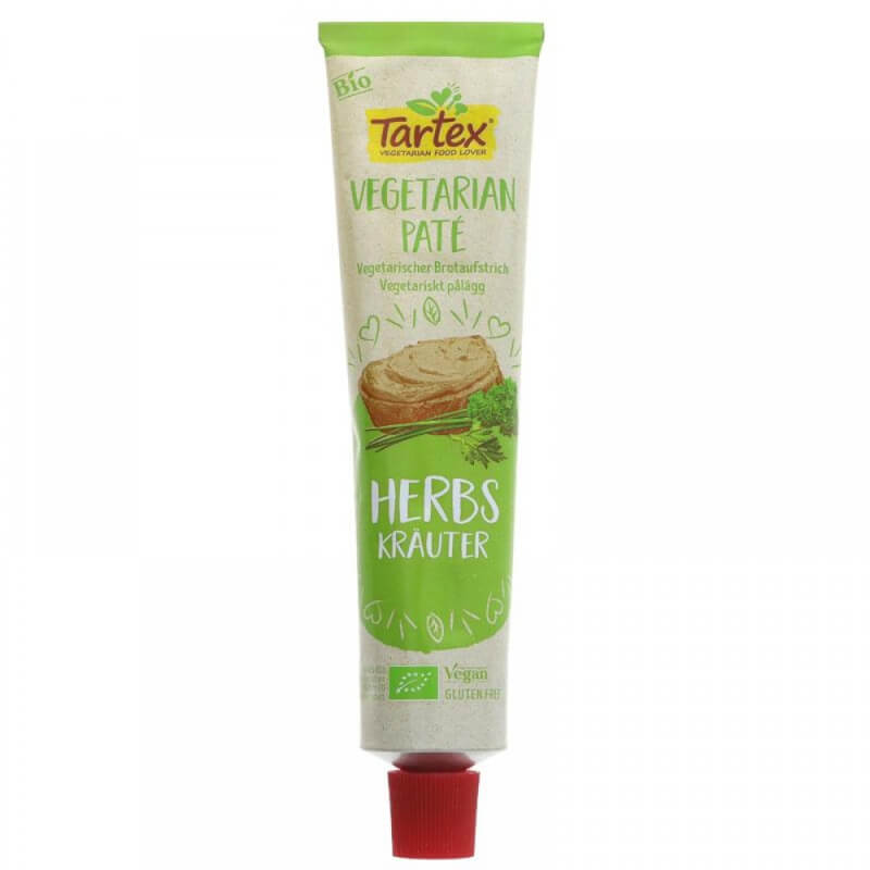 Vegetarische Kräuterpaste in Tube, glutenfrei, BIO, 200 g von TARTEX, frisch und cremig auf einem Teller liegend