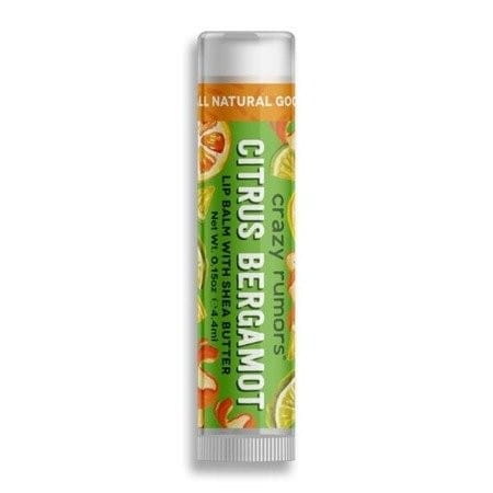 Natürlicher Lippenbalsam mit Zitrus-Bergamotte von CRAZY RUMORS, zeigt die Verpackung und den Balsam im offenen Zustand.