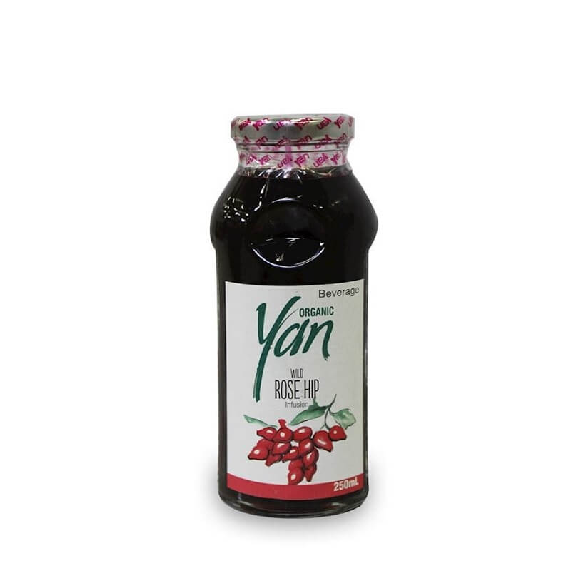 Bio Wildrosengetränk von YAN in 250 ml Flasche, zeigt die Flasche mit Wildrosenblüten und Bio-Label auf dem Etikett