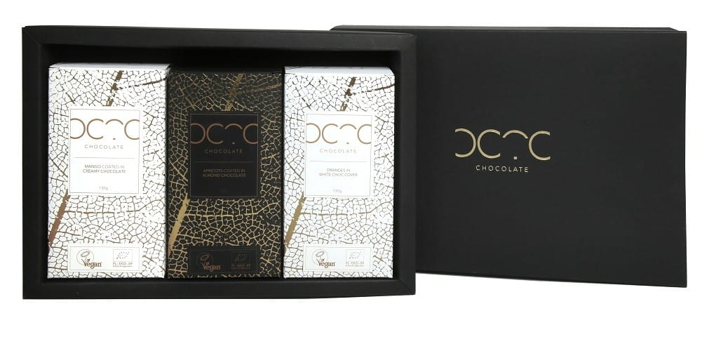 Geschenkset White Line von COCOA mit drei überzogenen BIO-Produkten, 490 g, in eleganter Verpackung.
