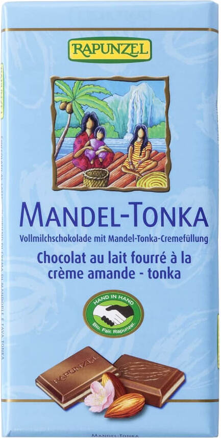 Milchschokolade mit Mandeln, Tonkabohnen und cremiger Füllung, BIO, 100 g, von RAPUNZEL, zeigt Schokoladentafel mit Nüssen und Bohnen