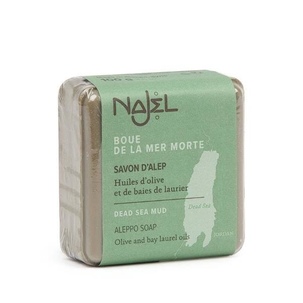 Seife von NAJEL mit Aleppo und Totes Meer Schlamm, natürliche Hautpflege, in einer weißen Seifenschale.