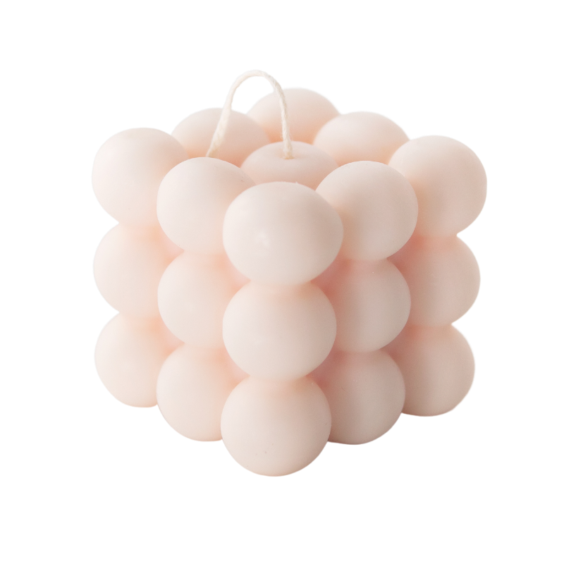 Große rosa Seifenblasenkerze aus 100 % natürlichem Rapswachs von MOHANI, mit filigranen Blasenmustern und elegantem Design