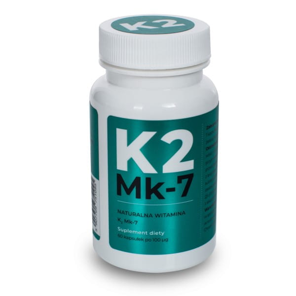Vitamin K2 MK7 100 mg Kapseln von VISANTO, Nahaufnahme der braunen Kapseln in einer Packung.