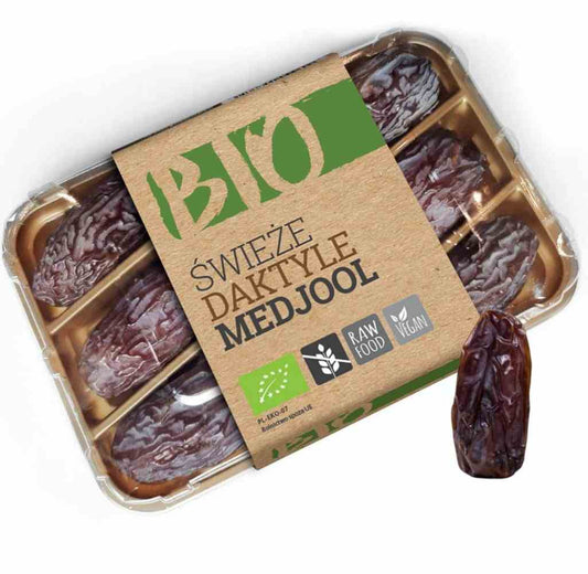 Bio Medjool-Datteln von Organic House, frische und saftige Datteln aus biologischem Anbau, in 180 g Packung sichtbar.