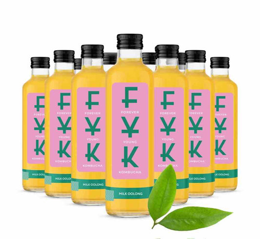 Bunte Flasche FYK Kombucha Milch Oolong in 0,25l mit etikett und Getränkespuren auf der Oberfläche