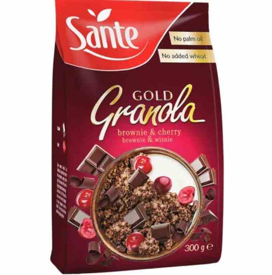 Sante Granola Gold Brownie Kirsche, 300g, zeigt die Packung mit goldener Verpackung und fruchtigen Kirschen im Bild.