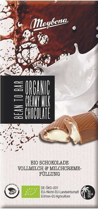 Bio-Milchschokolade mit Milch von Meybona, 100 g, zeigt die cremige Schokoladenstückchen in einer Packung