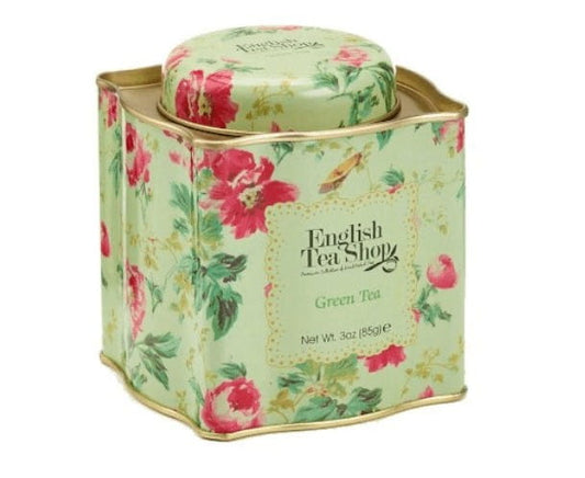 Grüner Bio-Tee in dekorativer Dose von ENGLISH TEA SHOP, 85 g, detailreiche Verpackung, frisches Teeblatt-Layout.