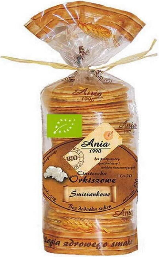 Dinkelcremekekse BIO von ANIA BIO, 120 g, frisch gebackene Kekse auf einem Teller mit Dinkel und cremiger Textur.