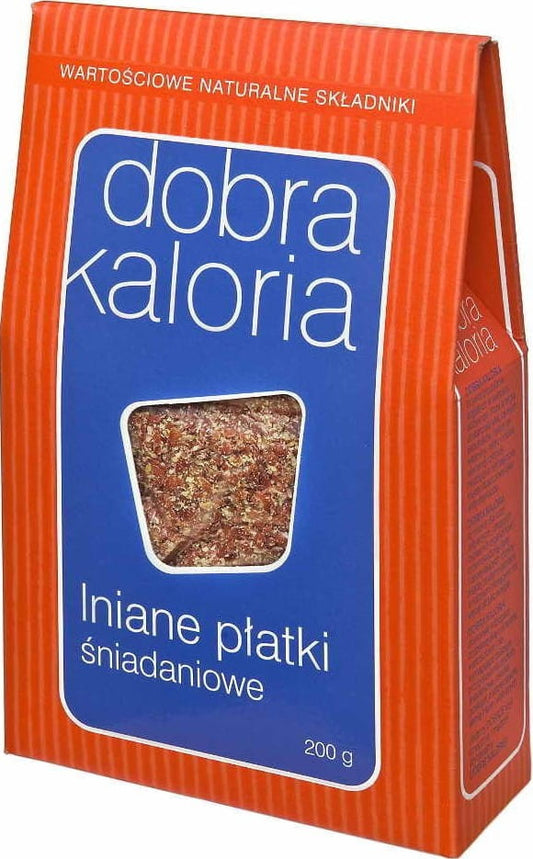 Leinen-Frühstückszerealien von DOBRA KALORIA, 200 g, in einer Schüssel mit frischen Früchten und Milch.
