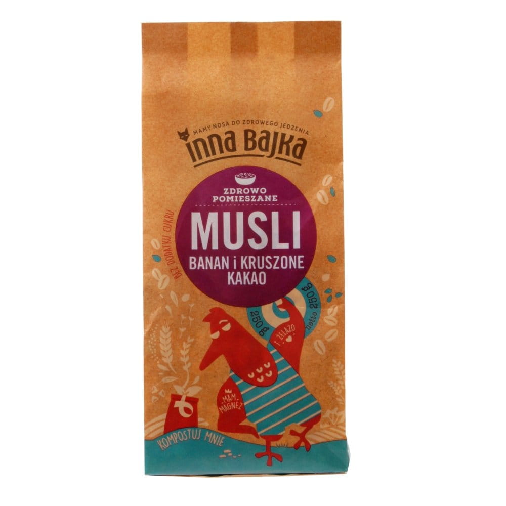 Bananenmüsli und Kakaopulver von INNA BAJKA, 250 g, in einer Schüssel mit Bananen und Kakaopulver.