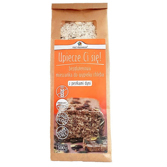 Glutenfreies Kürbiskernbrot von PIĘĆ PRZEMIAN, 500 g, frisch und knusprig, auf einem Holztisch gelegen.