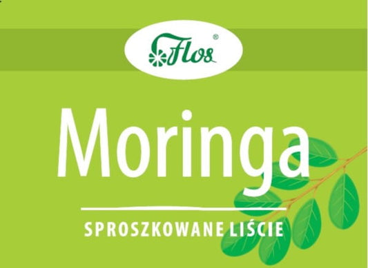Moringa-Pulverblätter von FLOS, 100g, Nahaufnahme der grünen getrockneten Moringa-Blätter in einer Packung.