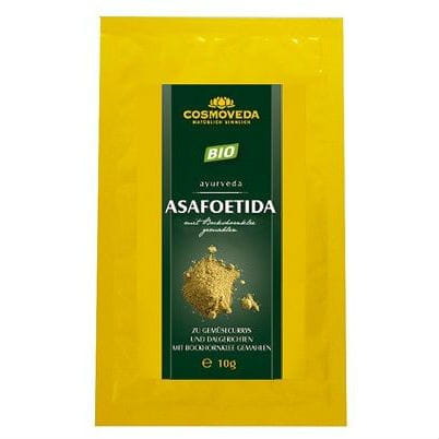 Indisches Asafoetida-Gewürz BIO von COSMOVEDA in einer 10 g Packung, gelbe Gewürzknolle auf weißem Hintergrund